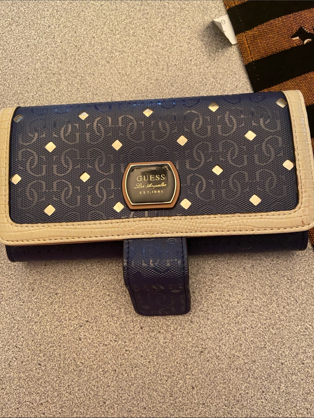 GUESS Navy and Cream Logo Continental Card Holder with Gold Accents wallet